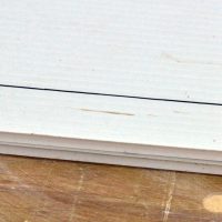 Lay the 2 sheets together