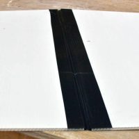Trim excess tape off ends