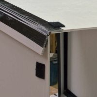 5. Attach the velcro flap so that the wall and roof are flush