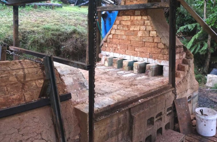 Chamber floor and flues