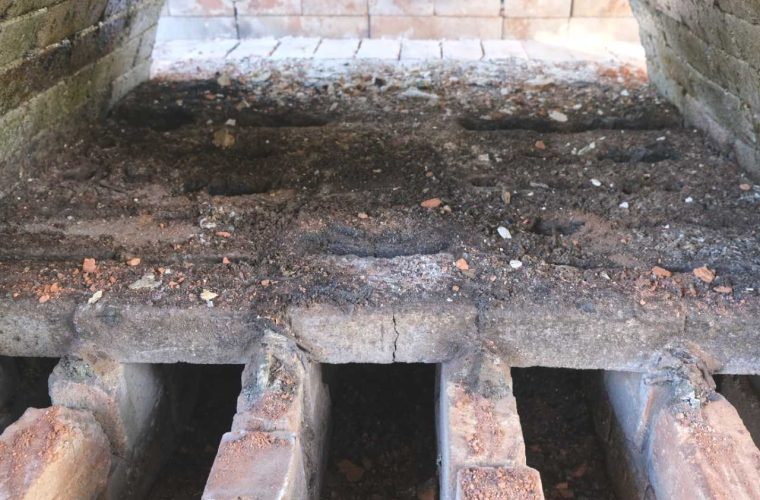 The old grate getting smashed out