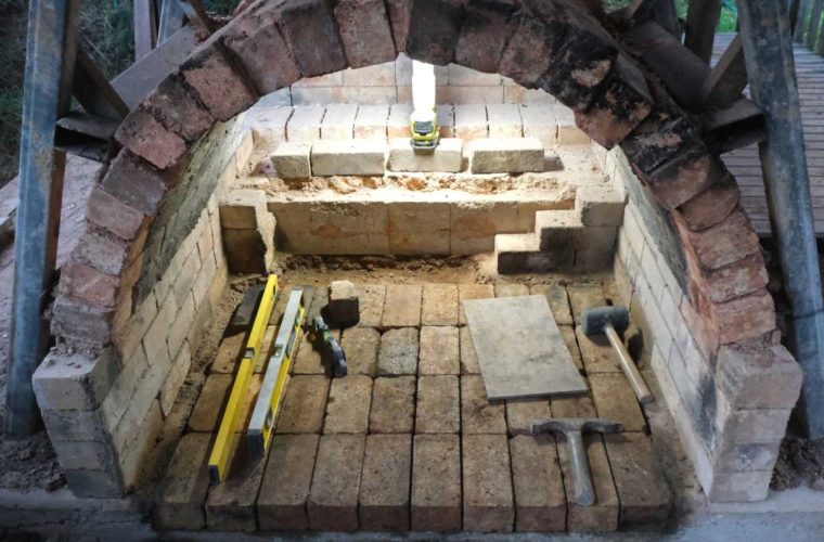 The firebox floor re-laid with bricks